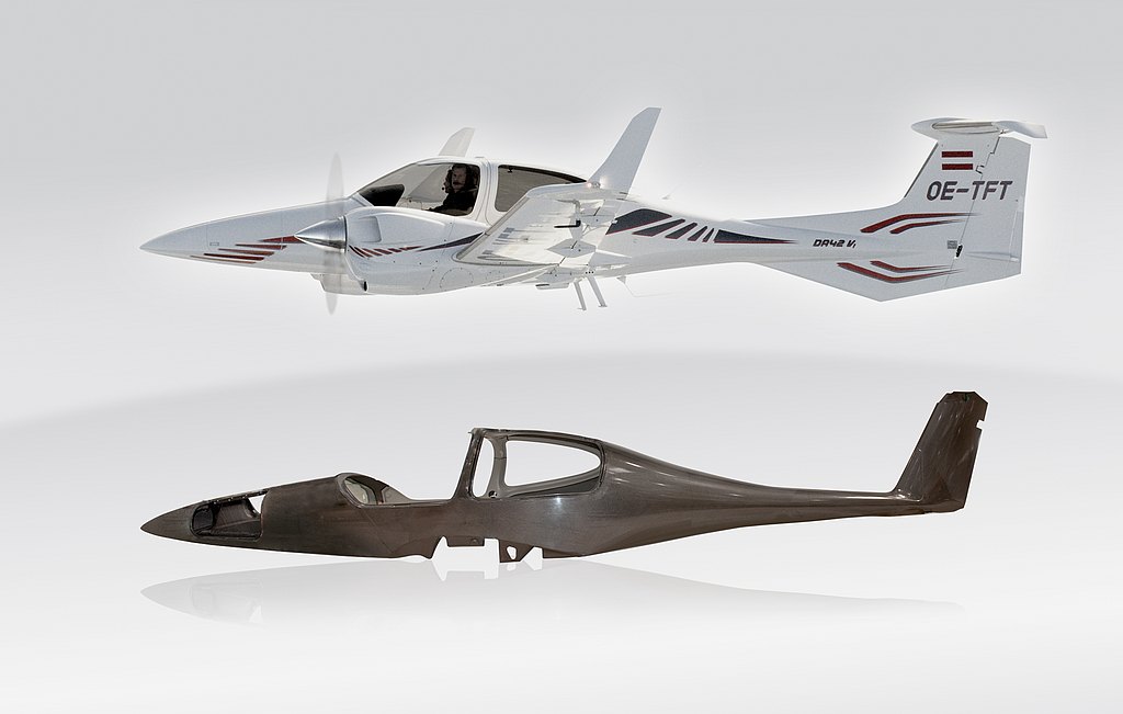 A DA42 in flight, illustrating its composite safety cell structure